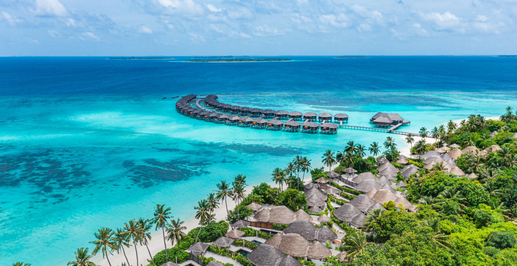 Домики на воде - культовый формат отдыха на Мальдивах. Источник фото: shutterstock.com